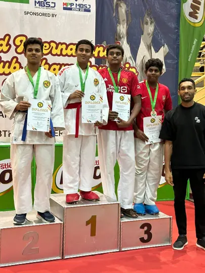 Karate medallists on the podium
